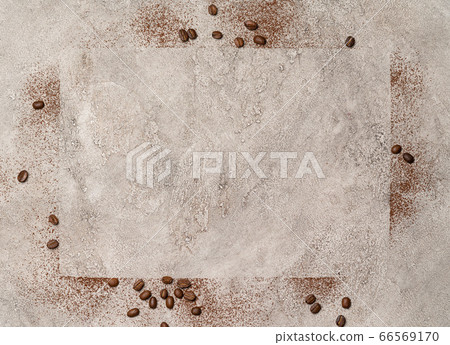 Cocoa powder and coffee bean frame on concrete background 66569170