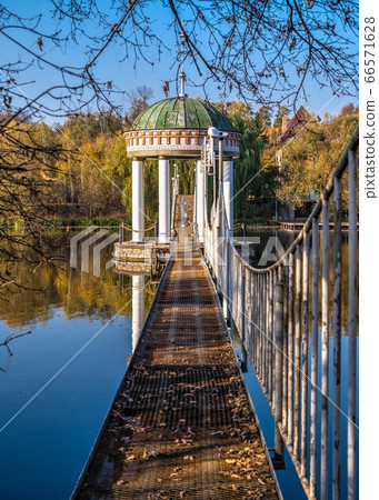 Gazebo in the middle of the lake at fall Gazebo in the middle of the lake at fall 66571628