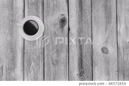 Cup of coffee on an old antique grungy wooden table 3d render illustration Cup of coffee on an old antique grungy wooden table 3d render illustration 66571650