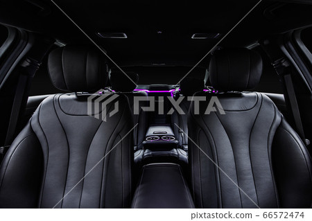 Car interior luxury black seats with ambient light Car interior luxury black seats with ambient light 66572474