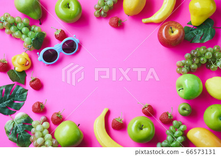 Fancy pink background with fruits Fancy pink background with fruits 66573131