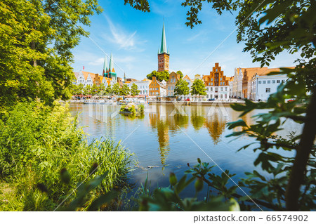 Historic city of Luebeck with Trave river in summer, Schleswig-Holstein, Germany 66574902