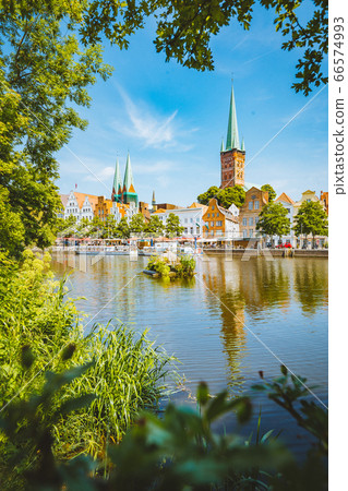 Historic city of Luebeck with Trave river in summer, Schleswig-Holstein, Germany Historic city of Luebeck with Trave river in summer, Schleswig-Holstein, Germany 66574993