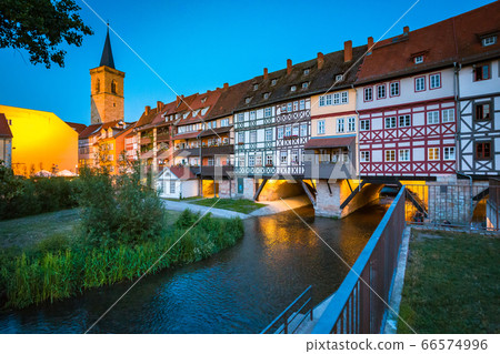 Historic city center of Erfurt with famous Kraemerbruecke bridge at twilight, Germany 66574996