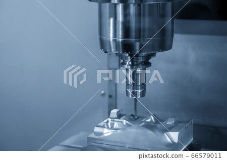 The  CNC  milling machine cutting  the mold parts. 66579011