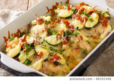 Tasty chicken baked gratin with zucchini, bacon Tasty chicken baked gratin with zucchini, bacon 66581446