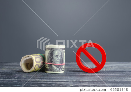 Rolls of money euros dollars and red prohibition symbol NO. Capital export outflow restrictions. Sanctions. Regulatory laws in the financial sector. Dedollarization, diversification exchange reserves. Rolls of money euros dollars and red prohibition symbol NO. Capital export outflow restrictions. Sanctions. Regulatory laws in the financial sector. Dedollarization, diversification exchange reserves. 66581548