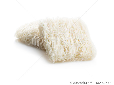 Uncooked white rice noodles 66582358
