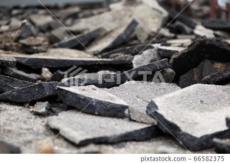 Fragments asphalt from road surface, destruction Fragments asphalt from road surface, destruction 66582375