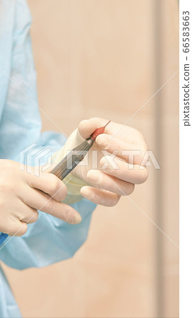 Ophthalmology laser microscope operation. Clinic room with doctor and parient. Gloves and medicine tools Ophthalmology laser microscope operation. Clinic room with doctor and parient. Gloves and medicine tools 66583663