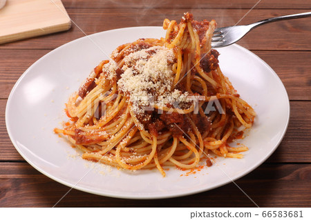 Scene with Bolognese lifted with a fork 66583681