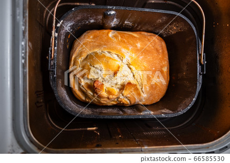 A freshly plepared loaf of homemade bread 66585530