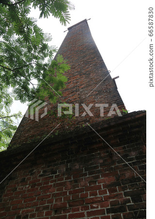 The chimney of the Besshi Copper Mine/Yamane Smelter of Mt. A symbol of Niihama's industrial heritage. 66587830