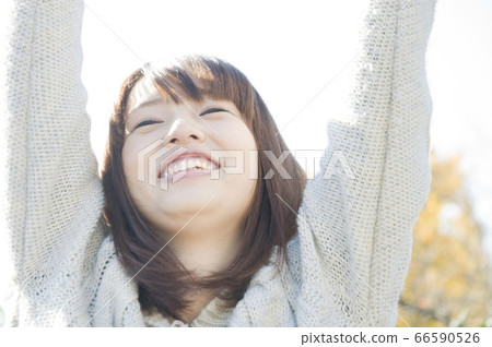 Rejoicing woman Rejoicing woman 66590526