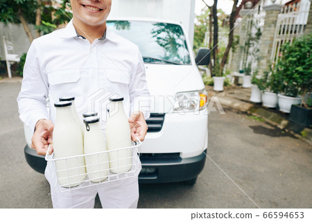 Joyful Delivery Man At Work Joyful Delivery Man At Work 66594653