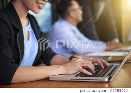 Unrecognizable People Working In Office Unrecognizable People Working In Office 66595964