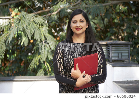 Woman With Paper Folder 66596024