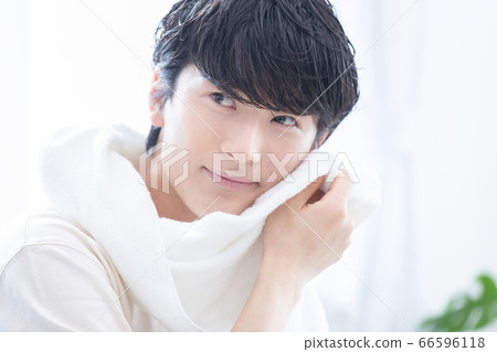 Beauty image A young man relaxing after taking a bath Beauty image A young man relaxing after taking a bath 66596118