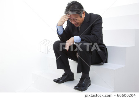 depressed businessman 66600204