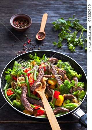 Fajitas of beef steak with broccoli, sweet pepper 66602699