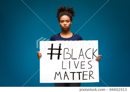 African american woman holding poster Black Lives Matter African american woman holding poster Black Lives Matter 66602913