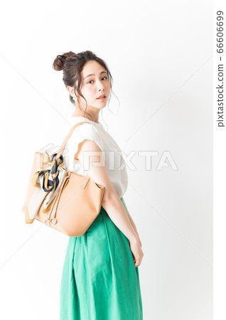 Office casual woman with shoulder bag 66606699