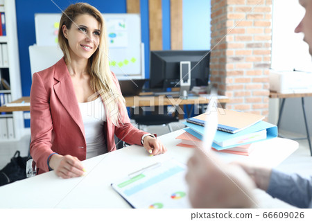 Blonde happy lady in office Blonde happy lady in office 66609026