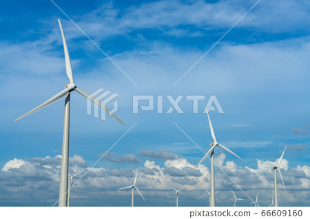 Wind turbines, blue sky and white clouds close-up 66609160