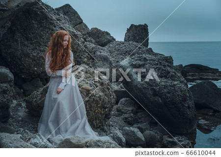 beautiful young girl in the morning under the 66610044