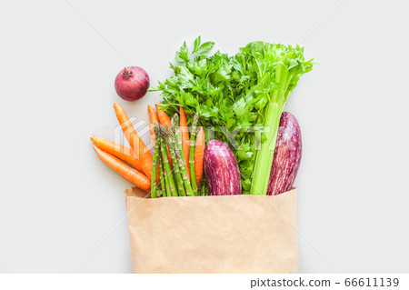 Fresh organic vegetables in craft shopping bag 66611139
