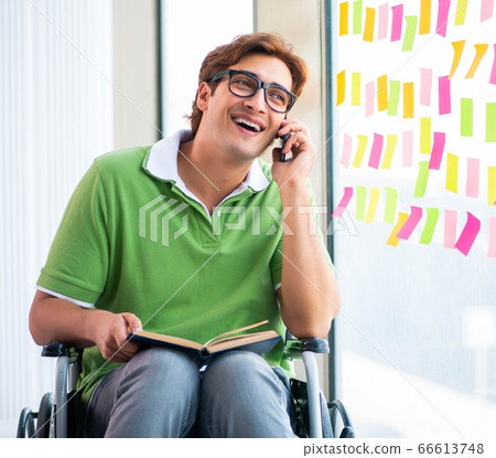 Young student in wheelchair with many conflicting priorities 66613748