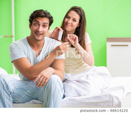 Man using pills for woman satisfaction Man using pills for woman satisfaction 66614220