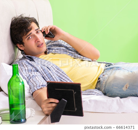 Young man sad in unhappy love concept Young man sad in unhappy love concept 66614371
