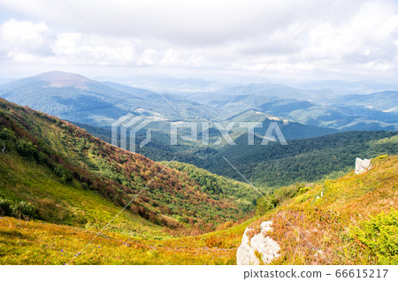 Hill in foggy sunny mountains. Scenery landscape Hill in foggy sunny mountains. Scenery landscape 66615217