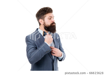 Man fix bow tie. Brutal businessman grooming. Man fix bow tie. Brutal businessman grooming. 66615628