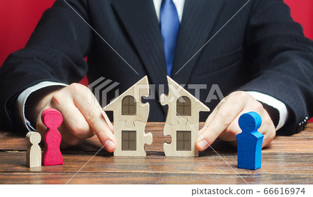 Lawyer controls separation and connection of house between husband and wife. Marriage contract. Former spouses in divorce process. Conflict resolution. Fair division of marital property real estate. 66616974