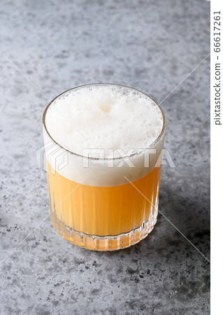 Pisco sour cocktail. Whiskey with lime, egg white, Pisco sour cocktail. Whiskey with lime, egg white, 66617261