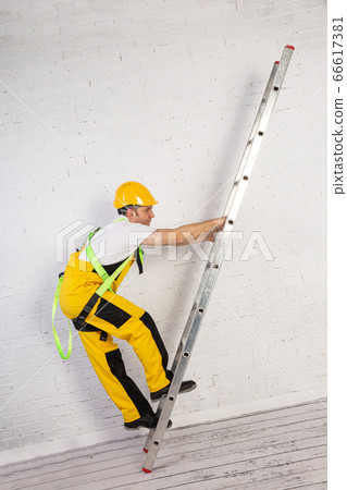 Irresponsible use of a ladder during construction Irresponsible use of a ladder during construction 66617381
