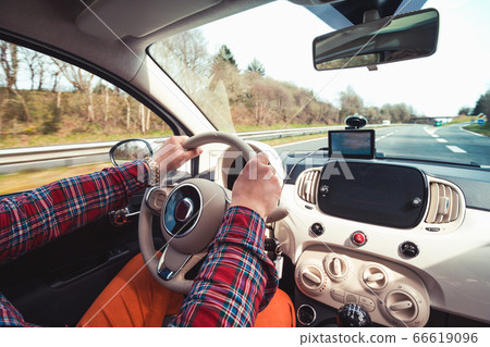 roadtrip man hands on the wheel roadtrip man hands on the wheel 66619096