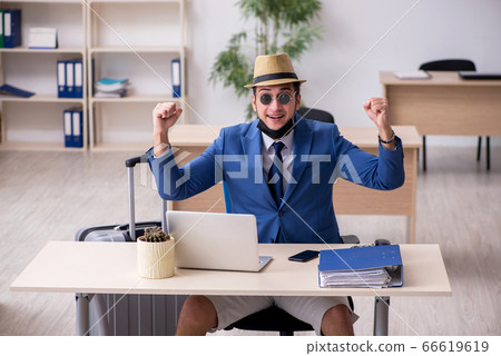 Businessman preparing for trip during pandemic 66619619
