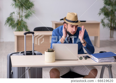 Businessman preparing for trip during pandemic 66619620