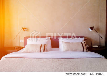 White Room in luxury hotel illuminated by sunlight White Room in luxury hotel illuminated by sunlight 66619820