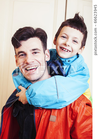 faher and son together having fun at home, lifestyle happy family, people at home faher and son together having fun at home, lifestyle happy family, people at home 66623945