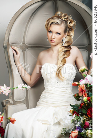 beauty young bride alone in luxury vintage interior with a lot of flowers, makeup and creative hairstyle beauty young bride alone in luxury vintage interior with a lot of flowers, makeup and creative hairstyle 66623946