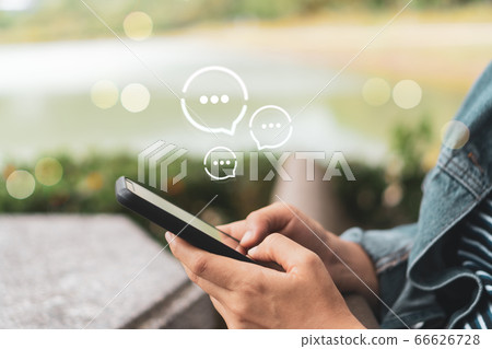 Women hand using smartphone typing, chatting Women hand using smartphone typing, chatting 66626728
