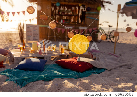 Blanket and cushions on beach Blanket and cushions on beach 66630595