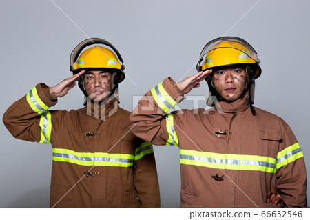 Asian male and female firefighter portrait, young smiling fireman in uniform 438 66632546