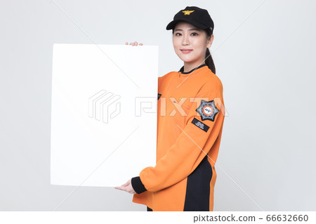 Asian male and female firefighter portrait, young smiling fireman in uniform 407 Asian male and female firefighter portrait, young smiling fireman in uniform 407 66632660