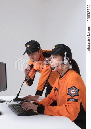 Asian male and female firefighter portrait, young smiling fireman in uniform 223 Asian male and female firefighter portrait, young smiling fireman in uniform 223 66632762