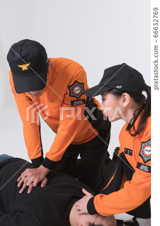 Asian male and female firefighter portrait, young smiling fireman in uniform 257 66632769